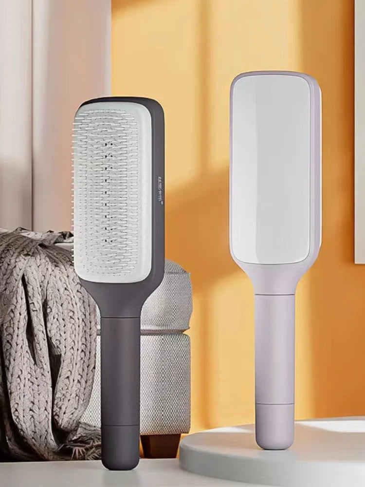 فرشاة شعر ذاتية التنظيف قابلة للدوران